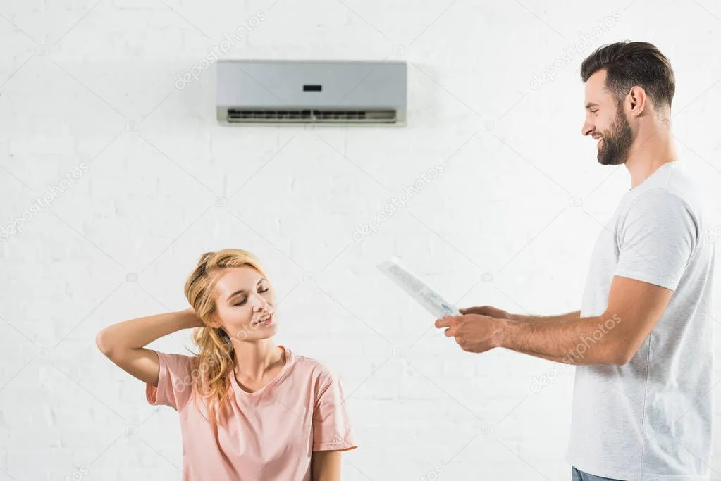 Famiglia in salotto climatizzato con Daikin Perfera